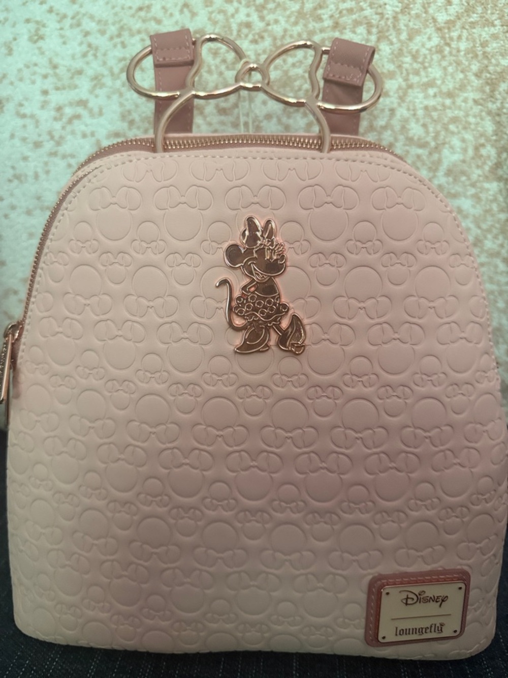Loungefly Minnie Mouse Embossed Pink Mini Backpack with Rose Gold Bow